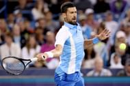 Novak Djokovic playing against Gael Monfils